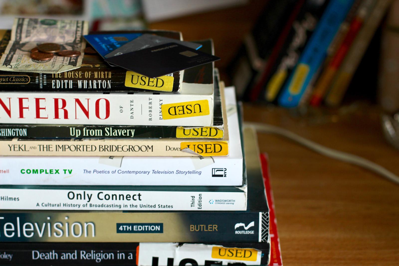 A report released Tuesday from The Institute For College Access and Success found that college graduates' student-loan debt increased two percent from the class of 2013 to the class of 2014. PHOTO ILLUSTRATION BY PAIGE TWOMBLY/DAILY FREE PRESS STAFF