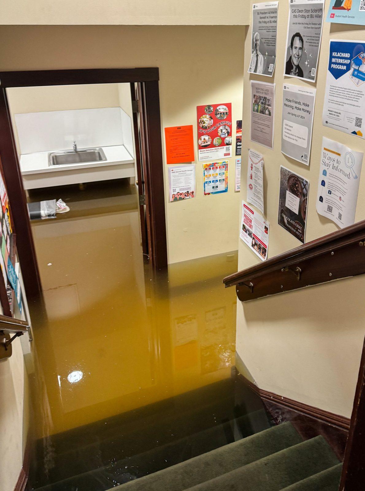 Flooding inside 117 Bay State Road. Boston University housing at 115 and 117 Bay State Road flooded on Saturday night after a water main broke. COURTESY OF PEYTON MILLER