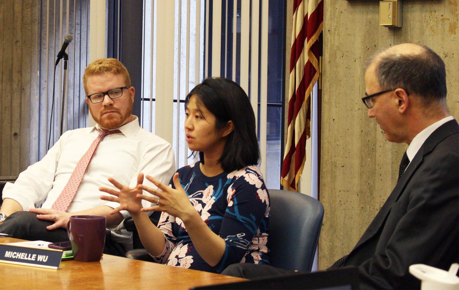 Boston City Council President Michelle Wu speaks alongside Councilor Matt O’Malley at a meeting for the Plastic Bag Ordinance Task Force Monday afternoon in the Piemonte Room at Boston City Hall. PHOTO BY KANKANIT​ ​WIRIYASAJJA/ DAILY FREE PRESS STAFF