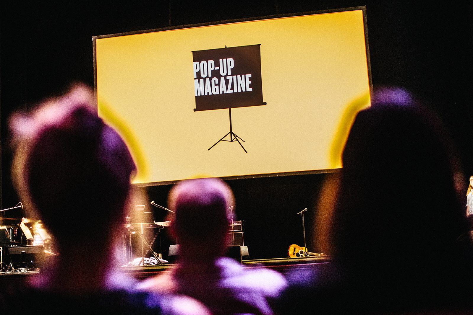 Audience members await an act at Pop-Up Magazine’s show Tuesday at The Wilbur Theatre in Boston as part of its fall tour. PHOTO COURTESY JON SNYDER