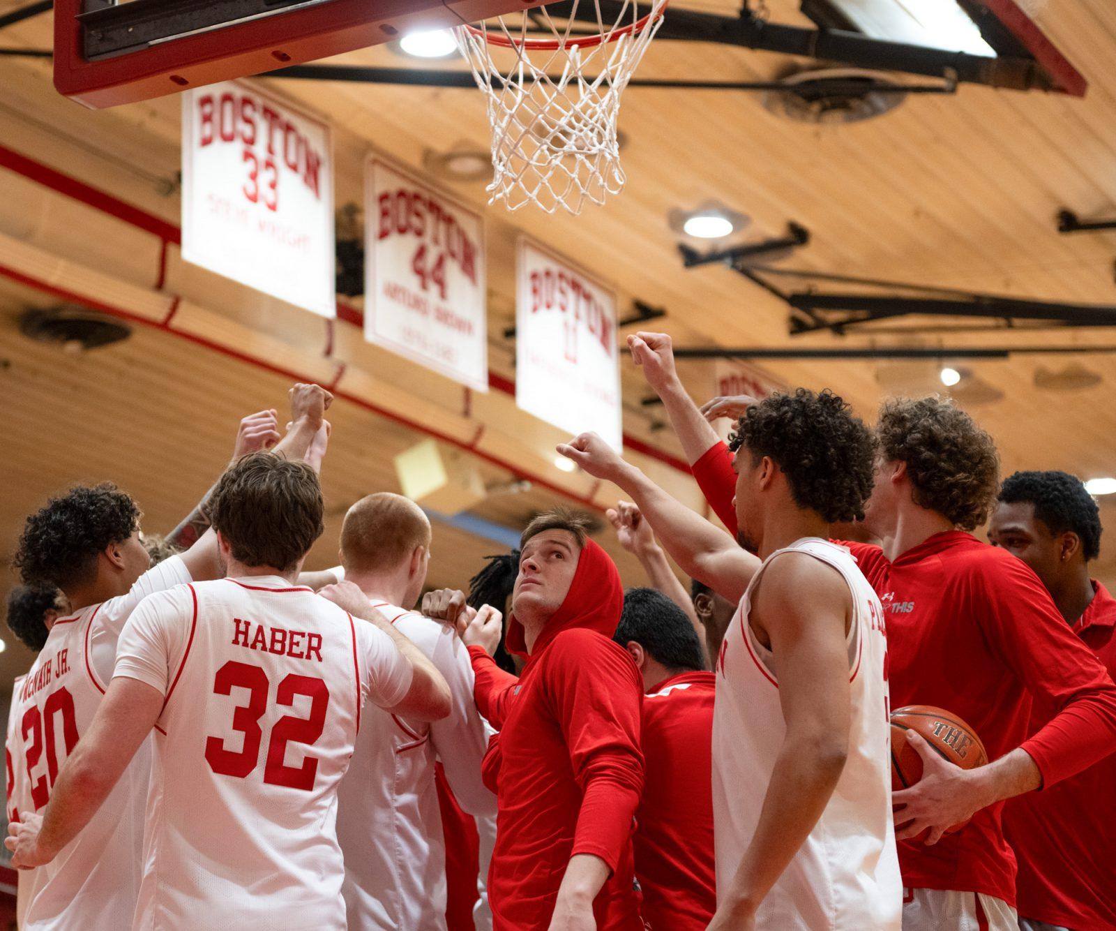 The Boston University men’s basketball team huddles under the net during their last game of the season against Lehigh on March 10. The Terriers concluded their inconsistent season with a 16-17 record, looking to gain momentum next year. MOLLY POTTER/DFP PHOTOGRAPHER 