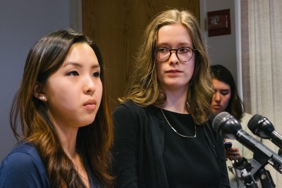 Erin Shyr, a junior in the College of Fine Arts, and Maria Currie, a student at the New England Conservatory, speak about their lawsuit against College of Fine Arts professor Eric Ruske and Boston University at a press conference Tuesday morning. PHOTO BY BRIAN SONG/DAILY FREE PRESS STAFF