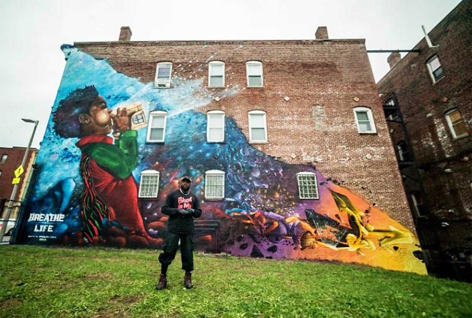 Robert ‘Problak’ Gibbs’ mural “Afro Futurism/ Breathe Life” is selected as one of the City of Boston’s public art projects in the Grove Hall Business District. PHOTO COURTESY CHRIS GAINES/ CITY OF BOSTON