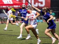 mckenzie irvine of boston university in a lacrosse game