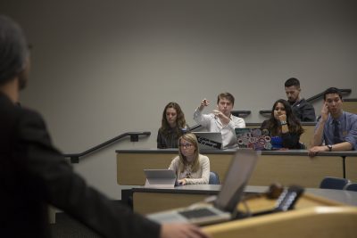 Zach Treichel clarifies a point on an official policy change during a BU Student Government meeting Monday night in the Photonics building. PHOTO BY NATALIE CARROLL/ DAILY FREE PRESS STAFF