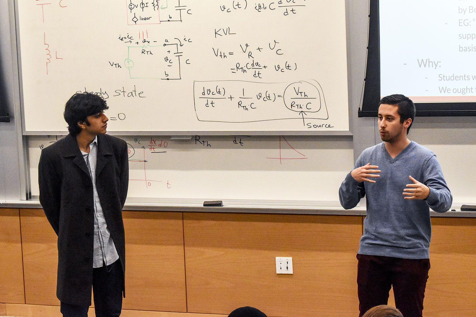 Aditya Jain (ENG ‘21), left, and Vincent D’Amato (SAR ‘21) proposed a resolution to release an official statement from the Undergraduate Student Government supporting or condemning Ben Shaprio’s visit to campus at the USG meeting Monday night. LAURYN ALLEN/ DAILY FREE PRESS
