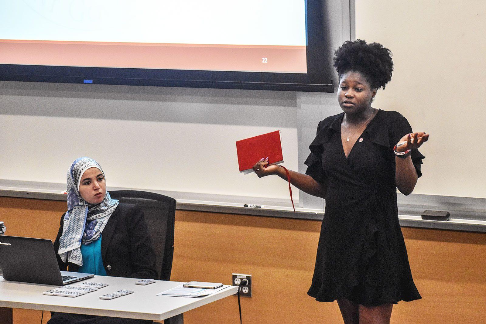 SG President Hafzat Akkani addresses Student Government at their first meeting of the semester. LAURYN ALLEN/ DAILY FREE PRESS STAFF