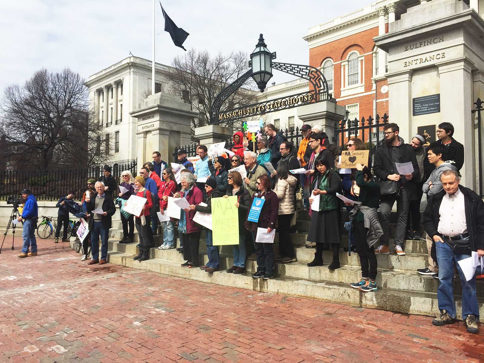 Locals gather at the Massachusetts State House Tuesday afternoon to encourage Gov. Charlie Baker to support the Safe Communities Act, a law that would protect residents from raids and religious registries. PHOTO BY SABRINA SCHNUR/ DAILY FREE PRESS STAFF