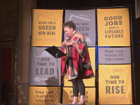rev. mariana white-hammond speaks at a dorchester event march 2019
