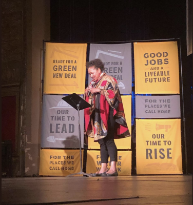 rev. mariana white-hammond speaks at a dorchester event march 2019