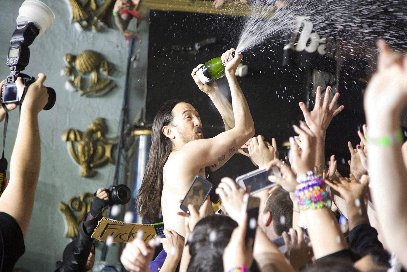 Steve Aoki jumps into the crowd at The Palladium in Worcester Saturday. PHOTO BY NATALIE CAROLL/ DAILY FREE PRESS STAFF