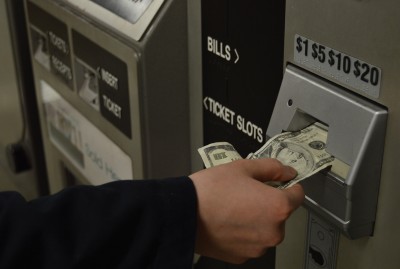 Officials from the Massachusetts Bay Transportation Authority announced Monday that they are looking to eliminate riders' ability to use cash as payment on buses and trains in an effort to create a more user-friendly system. PHOTO BY ERIN BILLINGS/DAILY FREE PRESS STAFF