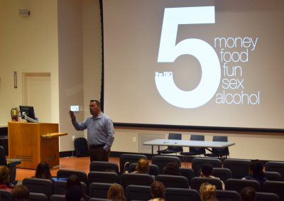 College leadership speaker T.J. Sullivan delivers a keynote address about how student organizations can promote activism in the school community Tuesday night in the Law Auditorium. PHOTO BY ASHLEY GRIFFIN/ DAILY FREE PRESS STAFF