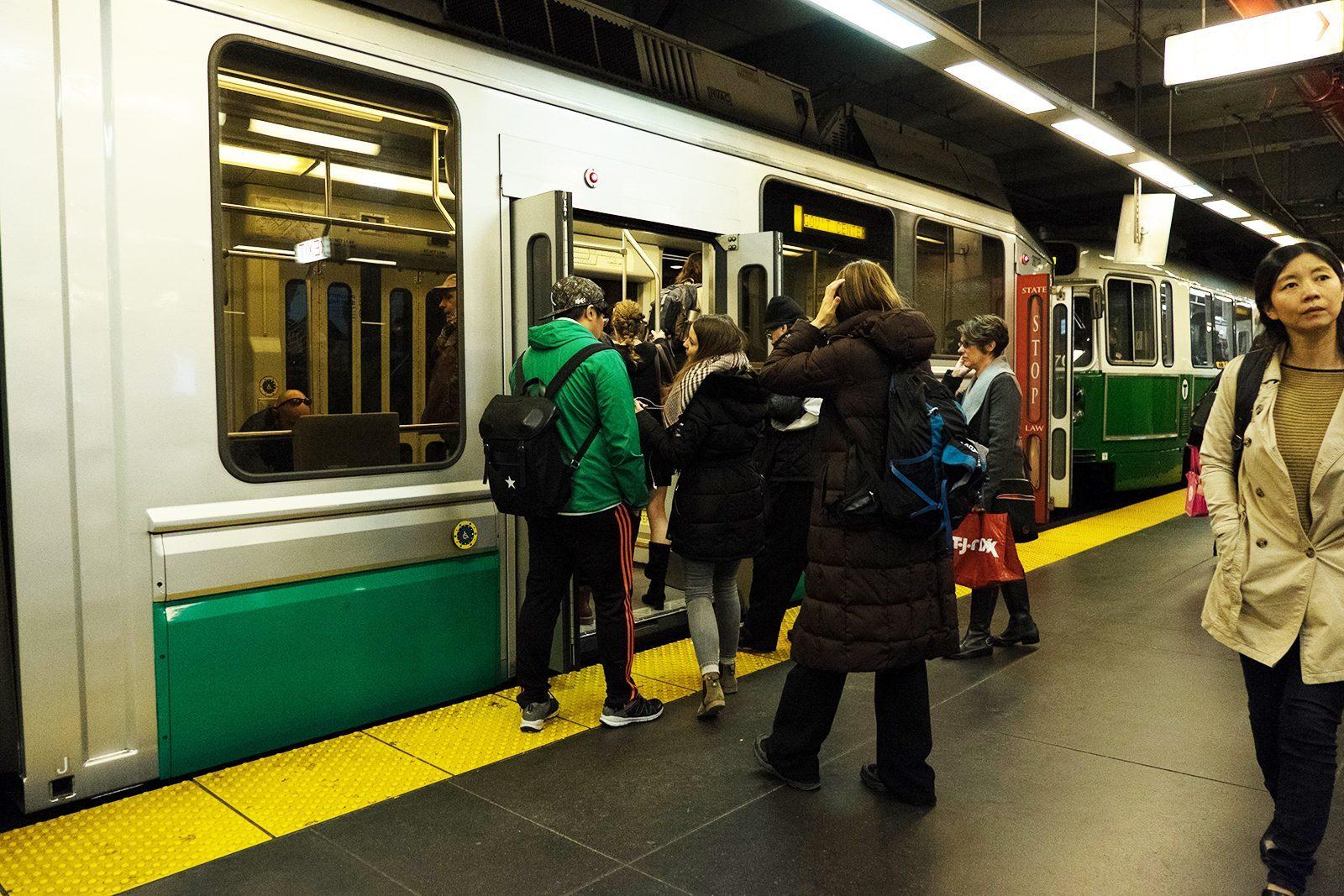 People board the Green Line train at Government Center Station. The MBTA is accelerating T line closures throughout 2020 in an attempt to complete eight years of renovations in one year. BRIAN SONG/ DFP FILE
