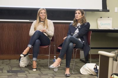 Danielle Weisberg and Carly Zakin, co-founders of the popular daily email newsletter theSkimm, speak to students about the importance of voting during a Monday night event hosted by Alpha Kappa Psi. PHOTO BY KANKANIT WIRIYASAJJA/ DAILY FREE PRESS STAFF