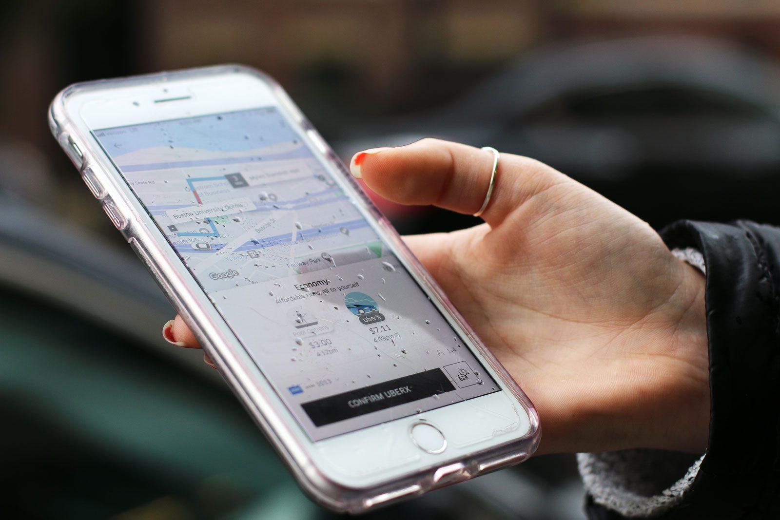 The advent of ridesharing apps like Uber and Lyft has made it difficult for traditional taxi drivers to attract riders. GABRIELLA HUTCHINGS/ DAILY FREE PRESS STAFF