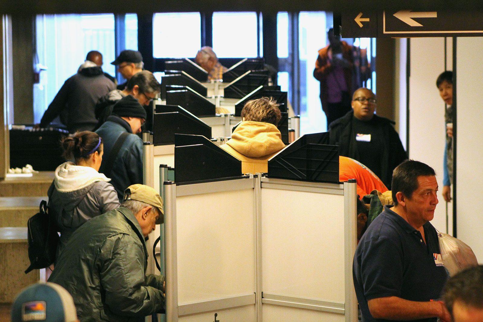 Voters at the Boston City Hall polling station voting in the 2018 Midterm Elections. Boston’s preliminary city council elections took place on Tuesday, narrowing down the field of candidates advancing to the Nov. 5 general election. RACHEL SHARPLES/ DFP FILE