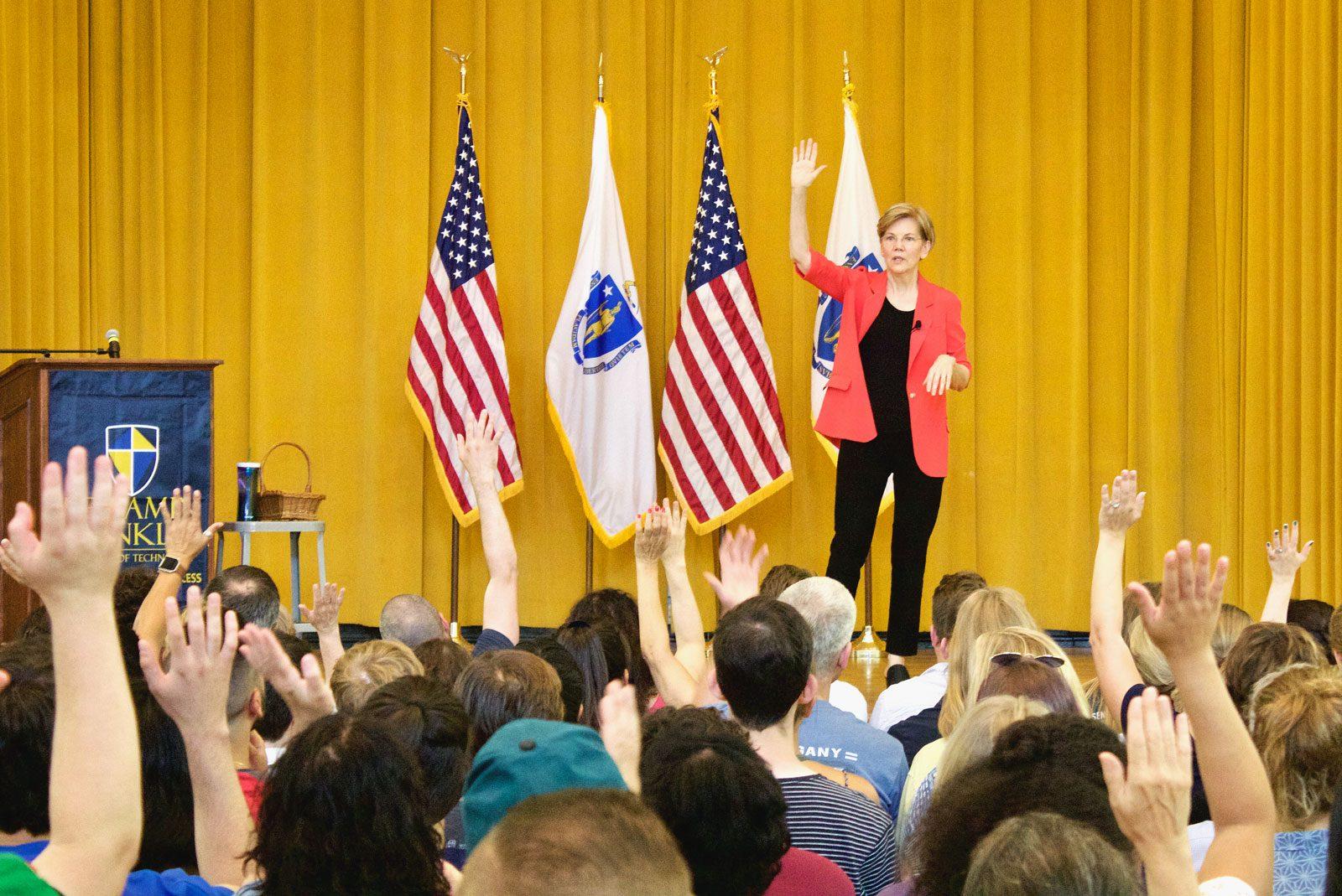 U.S. Sen. Elizabeth Warren (D-MA) speaks at a town hall last summer. Speaking at another town hall in Holyoke Saturday, she said she will be taking a “hard look” at running for president in 2020 after the November midterm elections. HANNAH SCHOENBAUM/ DAILY FREE PRESS STAFF