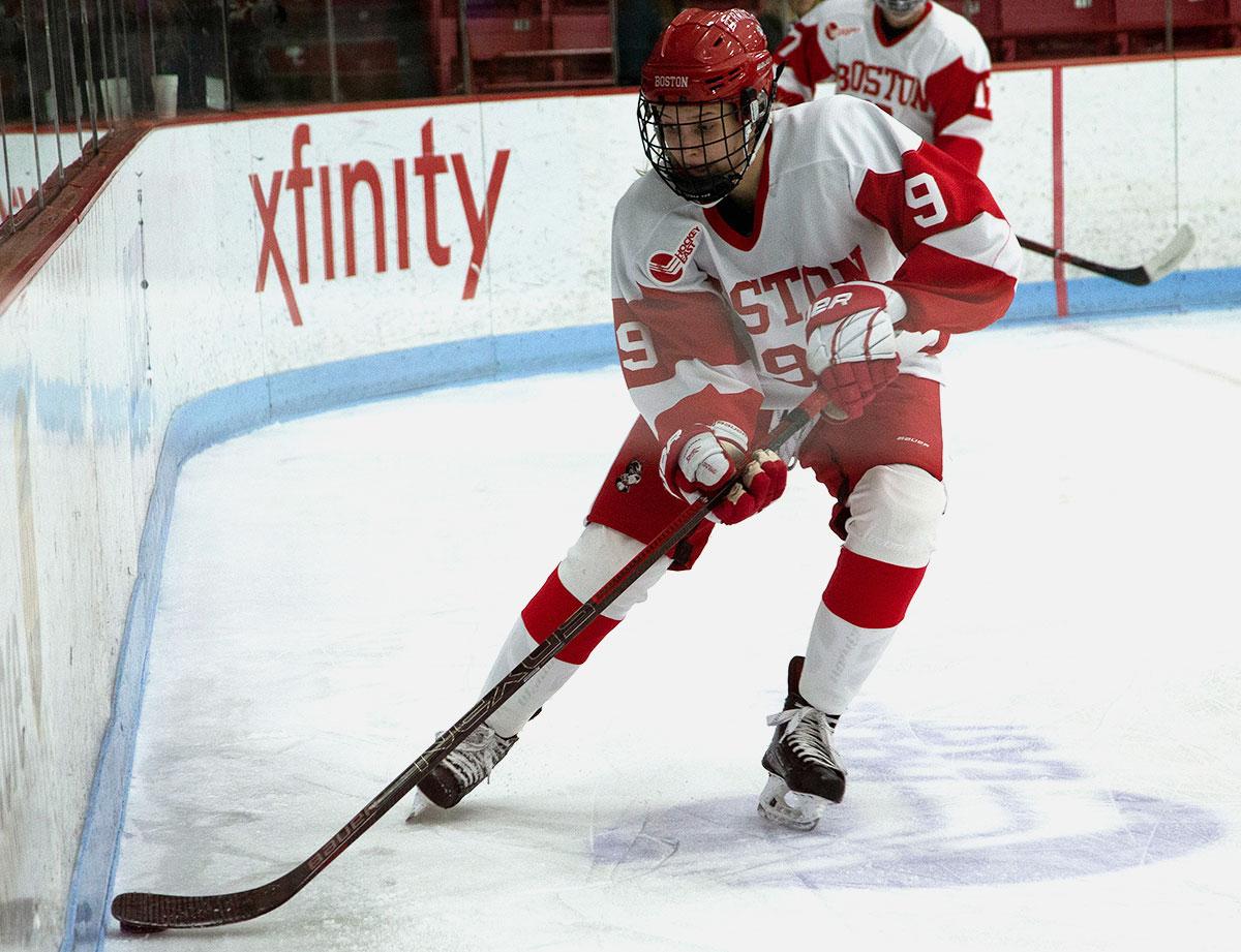 Senior defenseman Abby Cook, shown in a Feb. 2 game against the College of the Holy Cross, will be looking to extender her point streak in the matchup against Northeastern University this weekend. EMILY HUNTER/ DFP FILE
