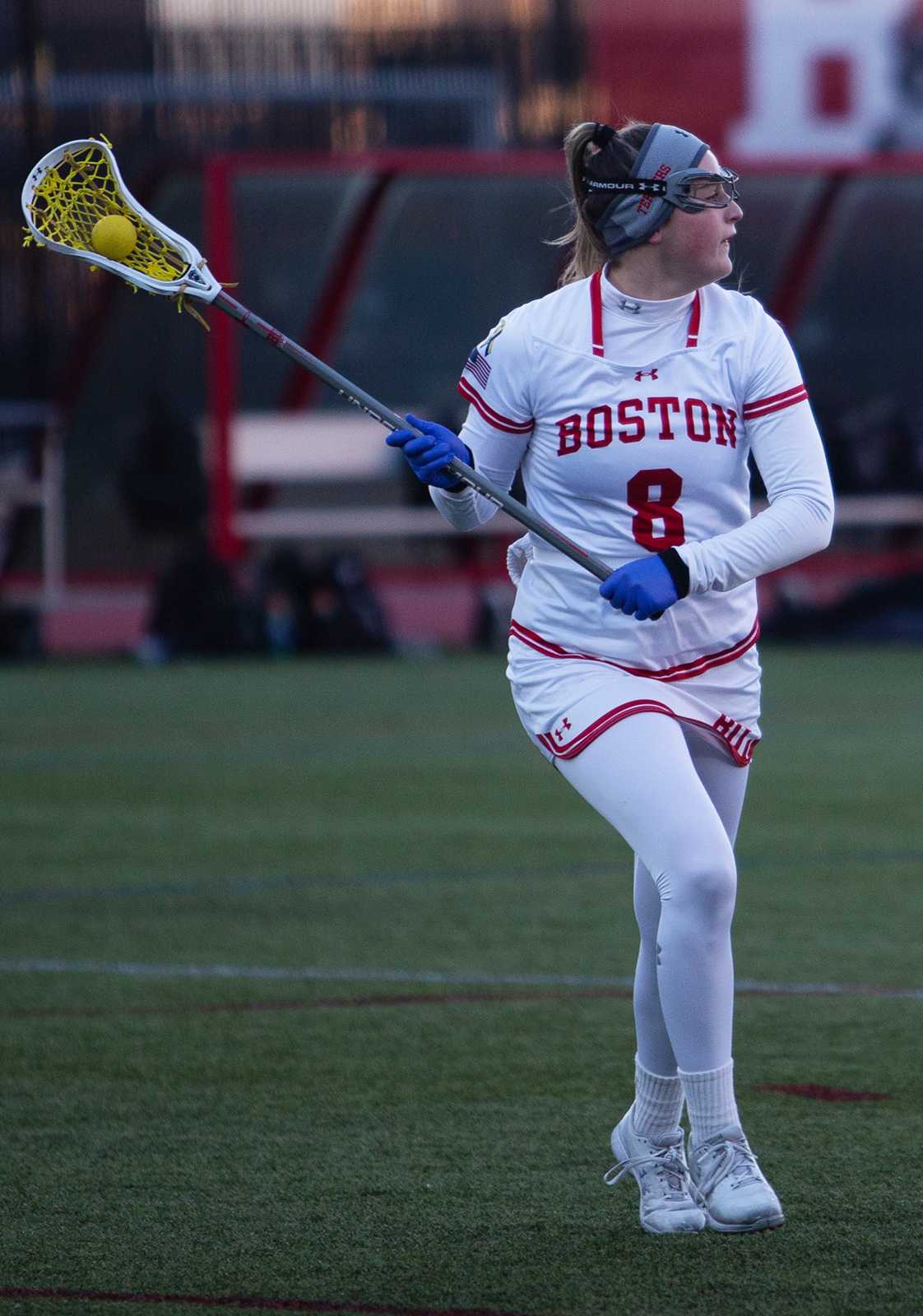 Senior attack Kailey Conry, shown in the Feb. 14 game against Niagara University, accounted for two of Boston University’s four goals with a goal and an assist in the Terriers 13-4 loss to Harvard University Wednesday. RACHEL SHARPLES/ DFP FILE
