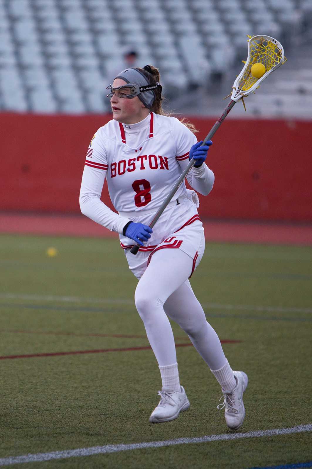 Senior attack Kailey Conry, shown in Friday’s game against Niagara University, tallied a season-high seven assists and scored two goals of her own in Boston University’s 22-4 over the University of Hartford Sunday. RACHEL SHARPLES/ DFP FILE