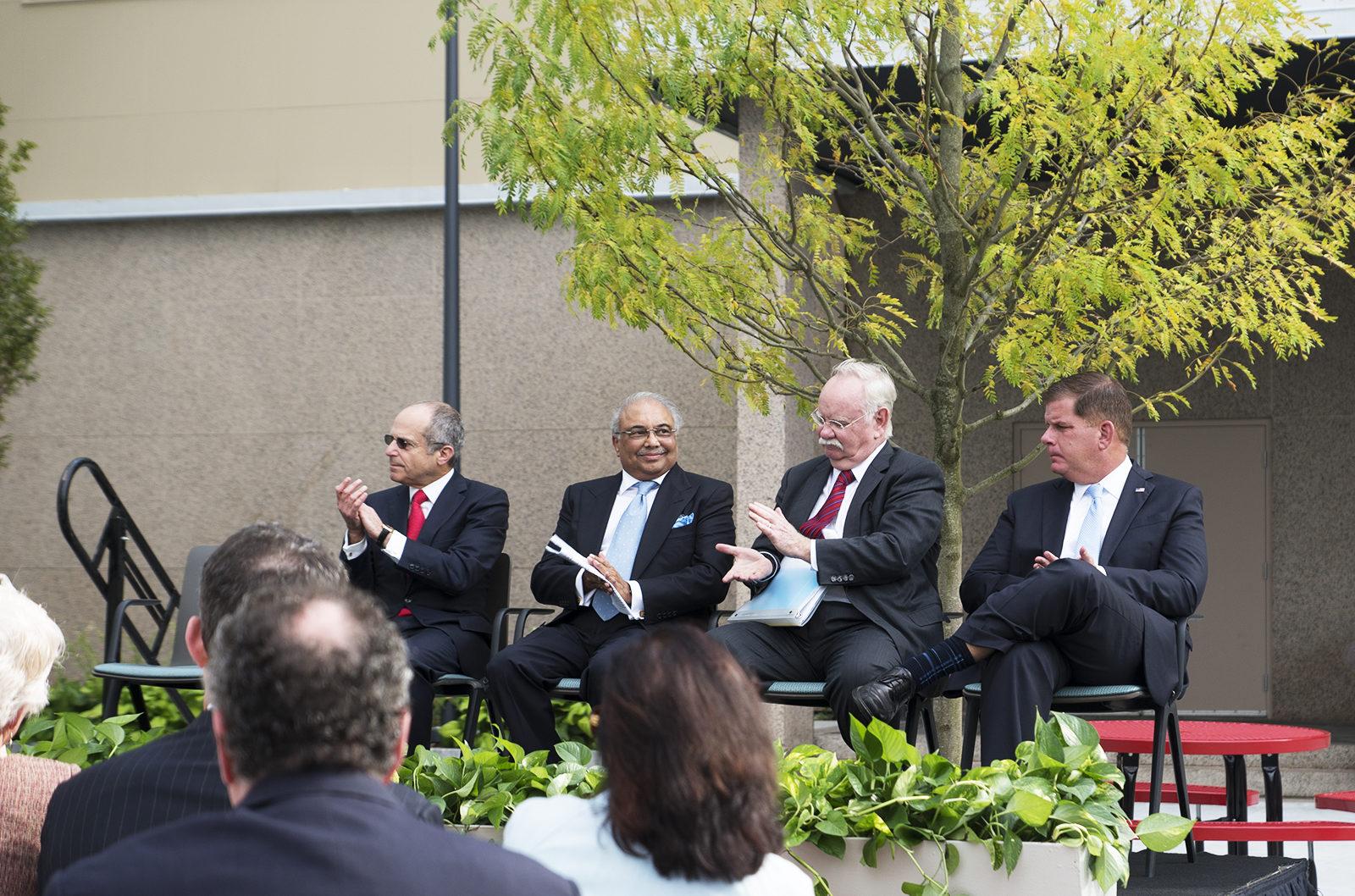 Boston University Board of Trustees Chair Kenneth Feld, philanthropist Rajen Kilachand, Boston University President Robert Brown and Mayor Martin Walsh at the graAnd opening of the Rajen Kilachand Center for Integrated Life Sciences and Engineering Thursday afternoon. PHOTO BY CHLOE GRINBERG/ DAILY FREE PRESS STAFF
