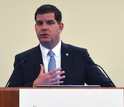Boston Mayor Martin Walsh speaks about issues surrounding the city’s bid for the 2024 Olympics at a community meeting at Suffolk University Law School Thursday night. PHOTO BY ERIN BILLINGS/DAILY FREE PRESS STAFF