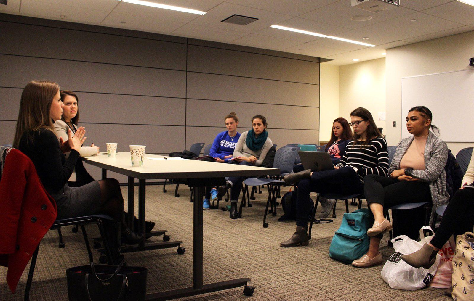 Students gather at Yawkey Center for Student Services Thursday night to express concerns about women's rights and gender issues. PHOTO BY KANKANIT WIRIYASAJJA/ DAILY FREE PRESS STAFF