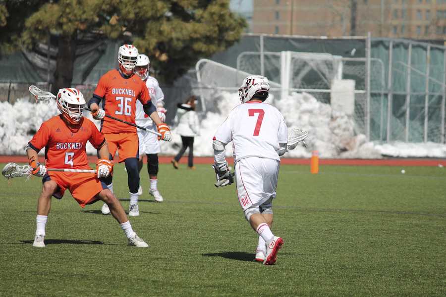 Senior attack Jack Wilson's point streak was extended to 47 games against Navy Saturday afternoon. PHOTO BY ABIGAIL FREEMAN/ DFP FILE PHOTO