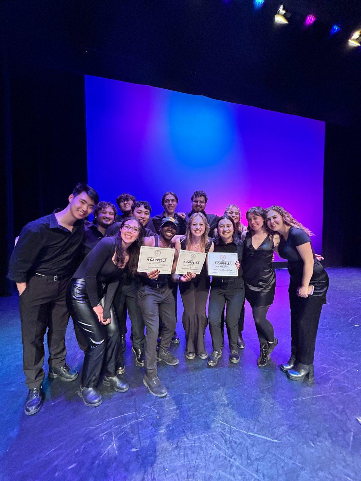 Members of the Boston University a cappella group the Allegrettos pose with their awards at the International Championship of Collegiate A Cappella Northeast Quarterfinals on March 2. The Allegrettos ended their competition season at the semifinals at Berklee College of Music on Saturday. COURTESY OF KATHRYN JORDAN