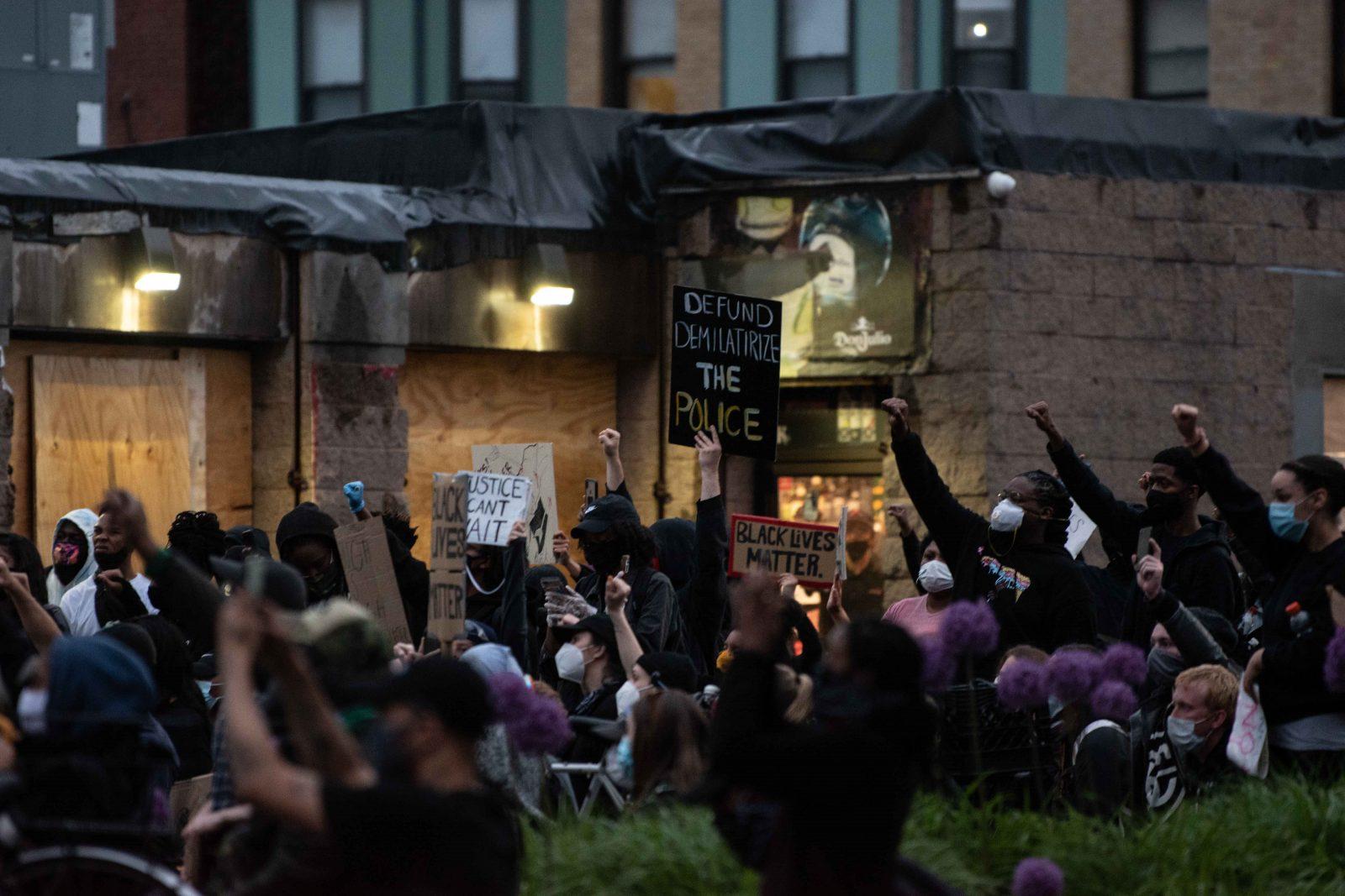 Demonstrators in front of a Roxbury police station, protesting police brutality. On Wednesday, Boston University held a Day of Collective Engagement to encourage faculty and students to have conversations about race. LAURYN ALLEN/ DAILY FREE PRESS STAFF
