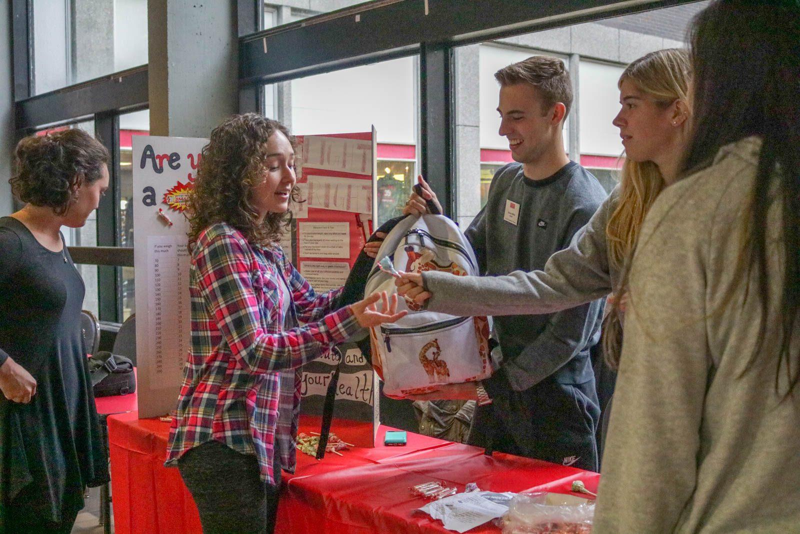 The Boston University Department of Occupational Therapy hosts an event on National Backpack Awareness Day to educate students and faculty on the harmful health effects of heavy and improperly-worn backpacks. SOFIA KOYAMA/ DAILY FREE PRESS STAFF