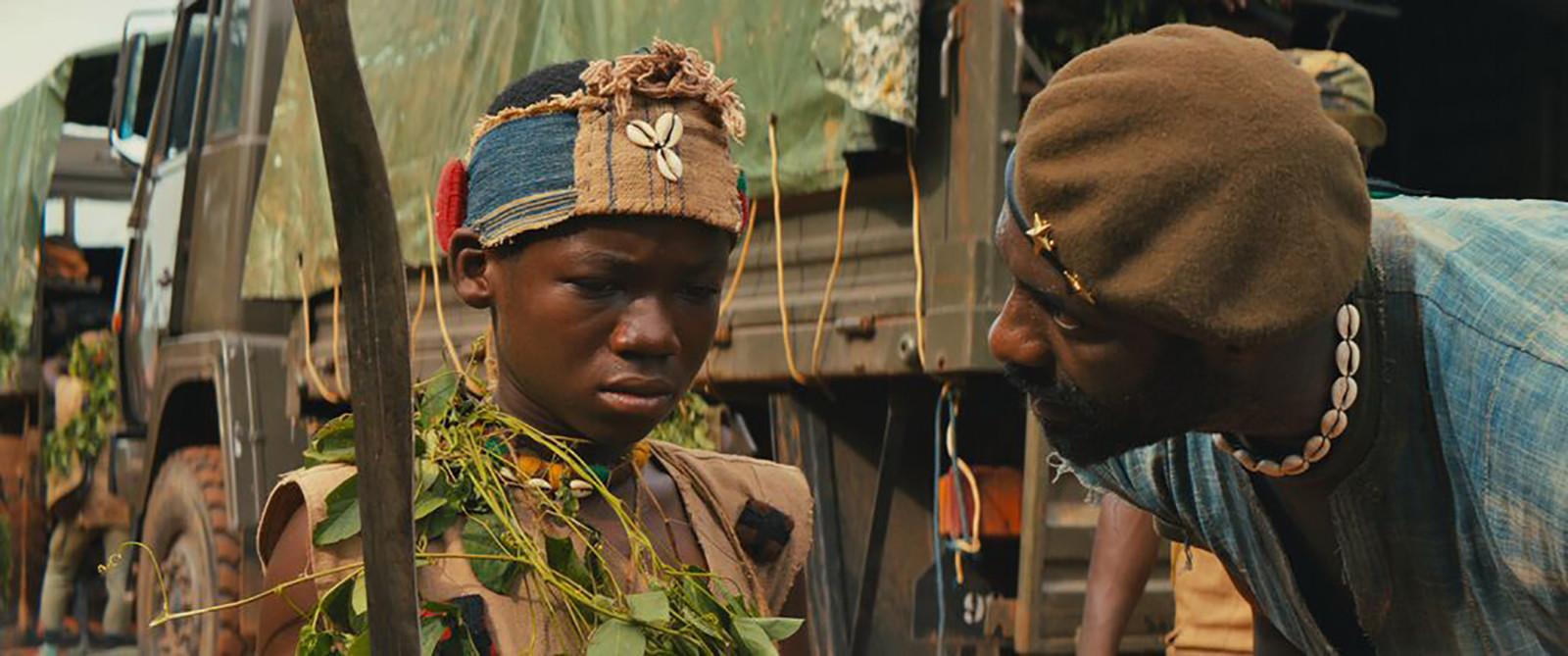 Idris Elba and Abraham Attah in the Netflix original film "Beasts of No Nation." PHOTO COURTESY NETFLIX
