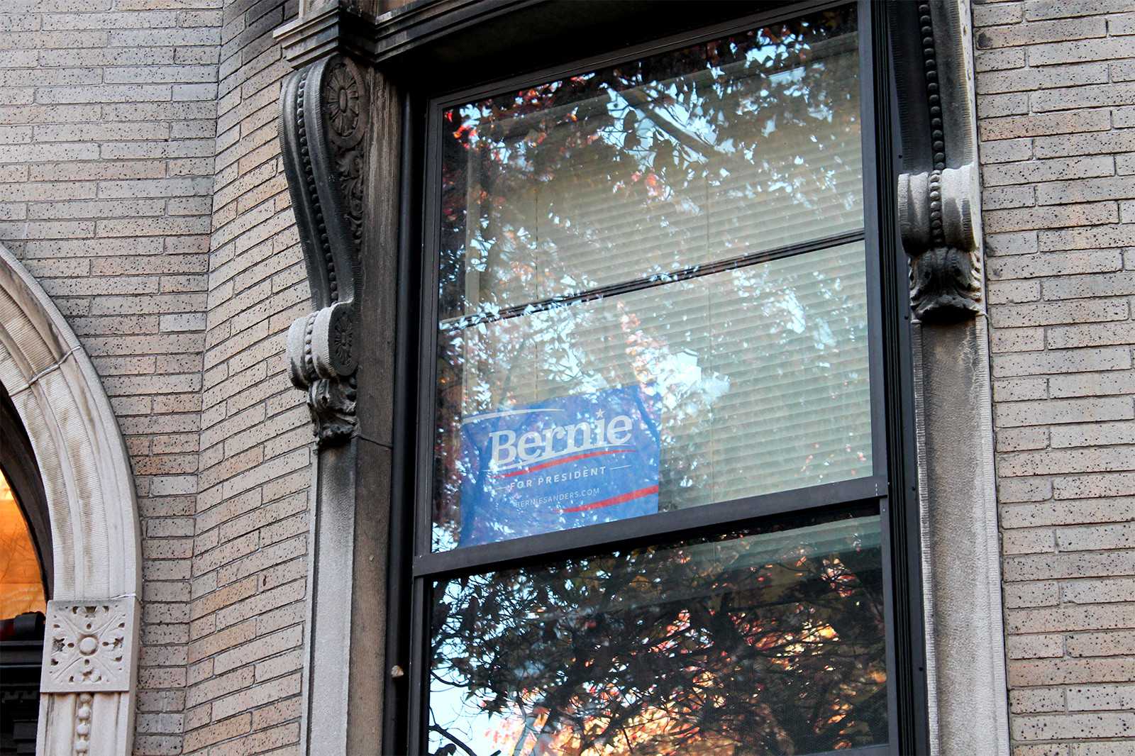 A student’s dorm room window on 180 Bay State Road displays a “Bernie for President” sign Tuesday afternoon. PHOTO BY JAKE FRIEDLAND/DAILY FREE PRESS STAFF