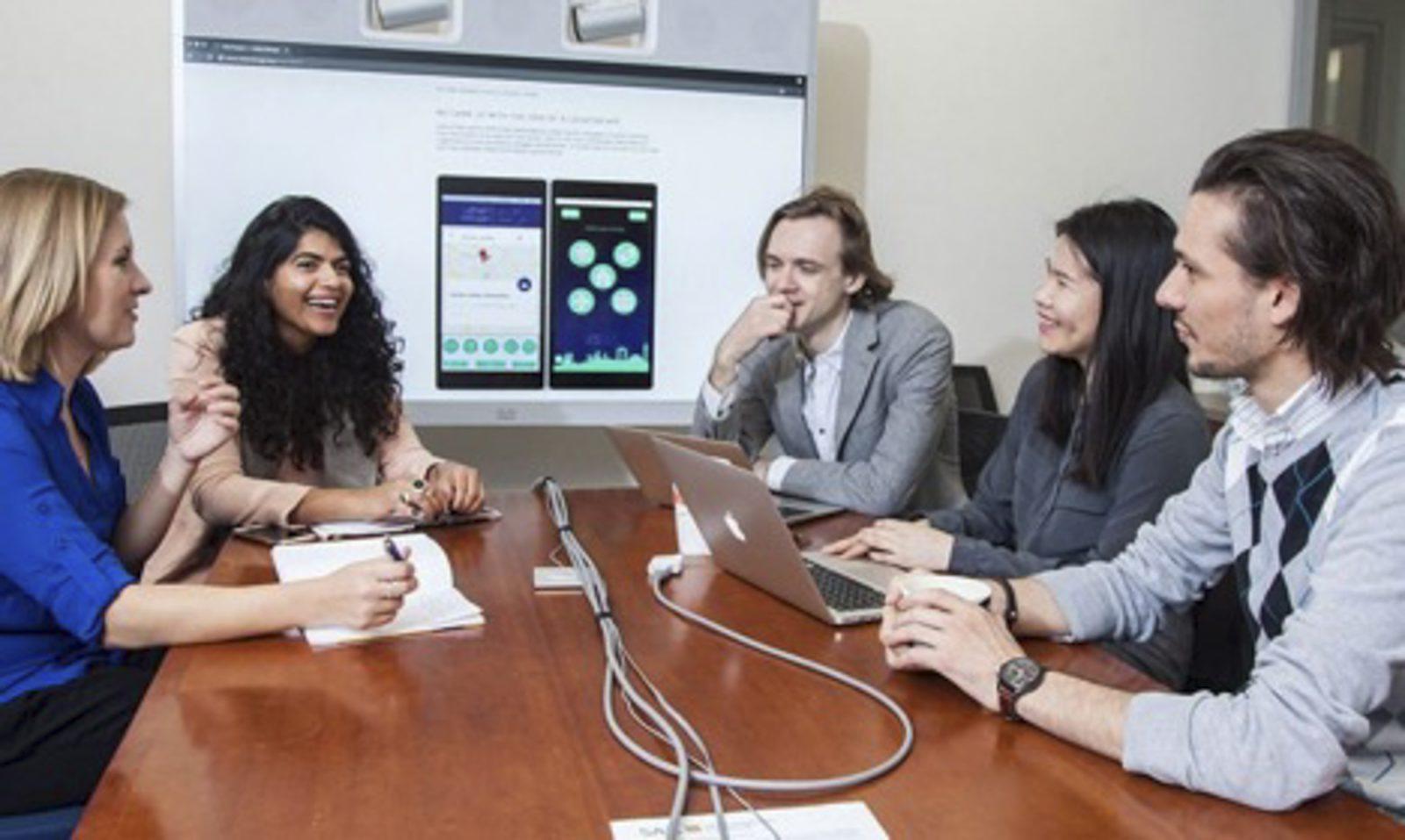 From left, MA student Vicky Kelberer and Professor Noora Lori work with Professor Andrei Lapets and Boston University’s Hariri Institute members Andrei Lapets, San Tran and Frederick Jansen. PHOTO COURTESY ERIKA SIDOR/ MICROSOFT