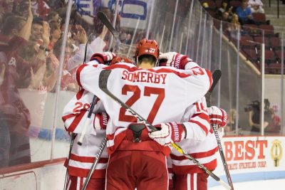 Terriers celebrate after scoring a goal. PHOTO BY JUSTIN HAWK/DAILY FREE PRESS