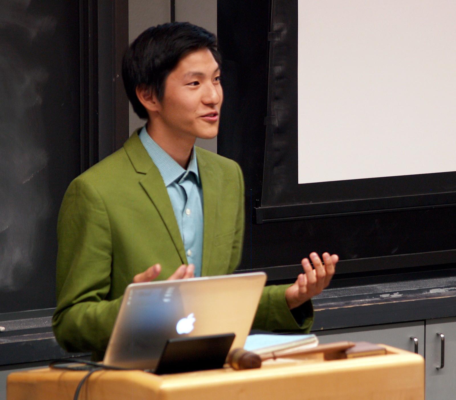 Student Government President Andrew Cho speaks at the last Boston University Student Government Senate meeting Monday at the Boston University Photonics Center. PHOTO BY KELSEY CRONIN/DAILY FREE PRESS STAFF