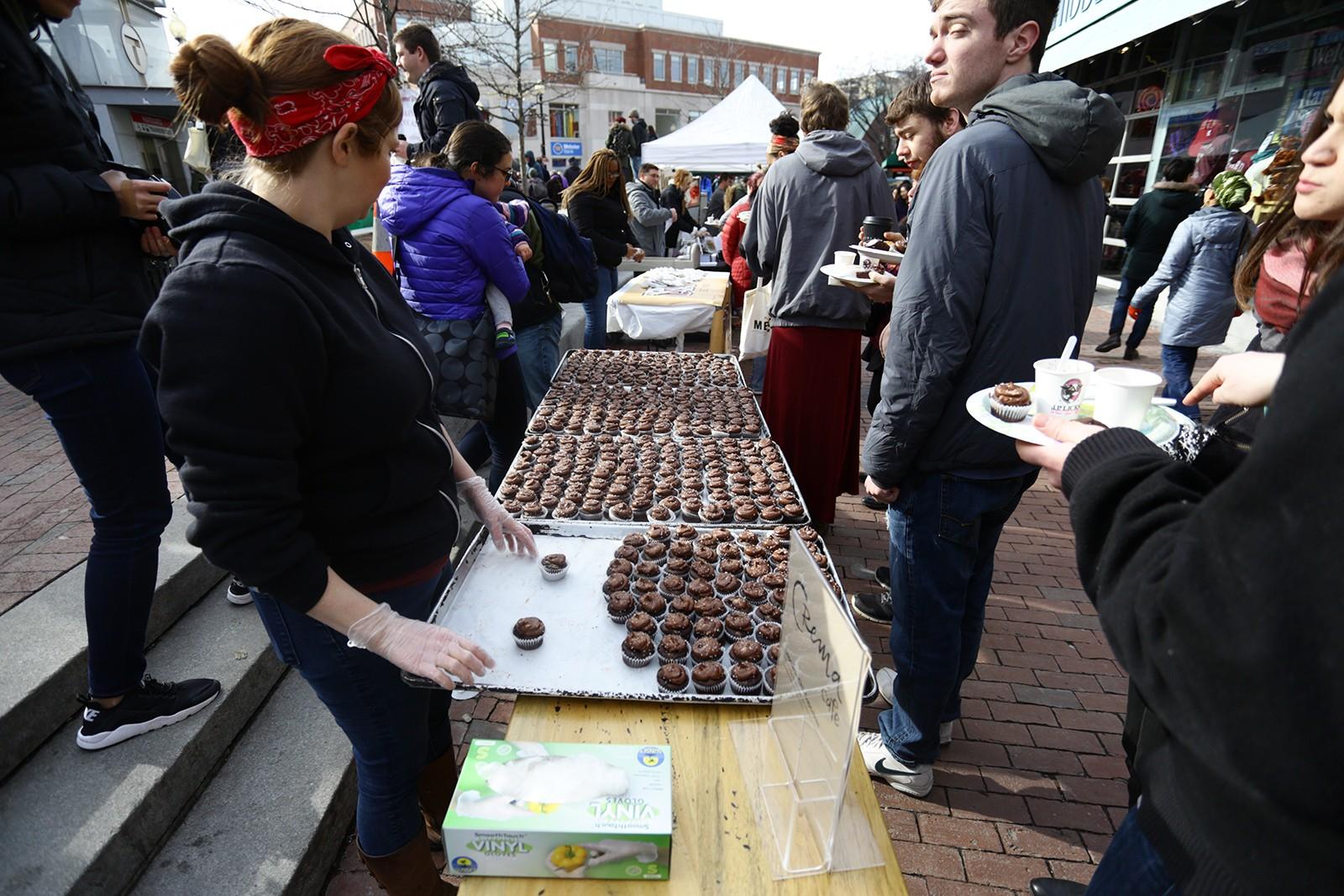 Attendees enjoy local treats at the 8th Annual Chocolate Festival on Brattle Plaza in Harvard Square Saturday afternoon. PHOTO BY JOHNNY LIU/DAILY FREE PRESS STAFF
