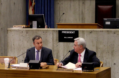 Boston City Council members Sal LaMattina and Michael Flaherty speak to one another during the City Council meeting Wednesday afternoon. PHOTO BY BRIGID KING/DAILY FREE PRESS CONTRIBUTOR