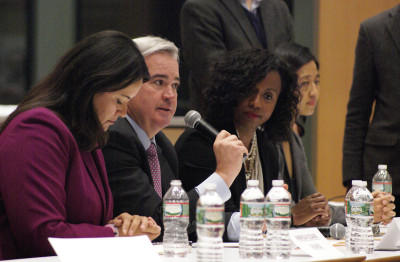 From left, Annissa Essaibi-George, Michael Flaherty, Ayanna Pressley and Michelle Wu speak during the “Boston At-Large City Council Forum” at the Bolling Municipal Building in Roxbury on Monday night. PHOTO BY JAKE FRIEDLAND/DAILY FREE PRESS STAFF