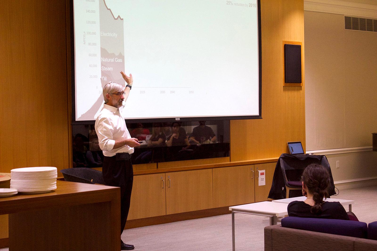 Professor Anthony Janetos discusses plans for Boston University’s Climate Action Plan Thursday night at Kilachand Honors College. PHOTO BY MAGGIE LEONE/ DAILY FREE PRESS STAFF