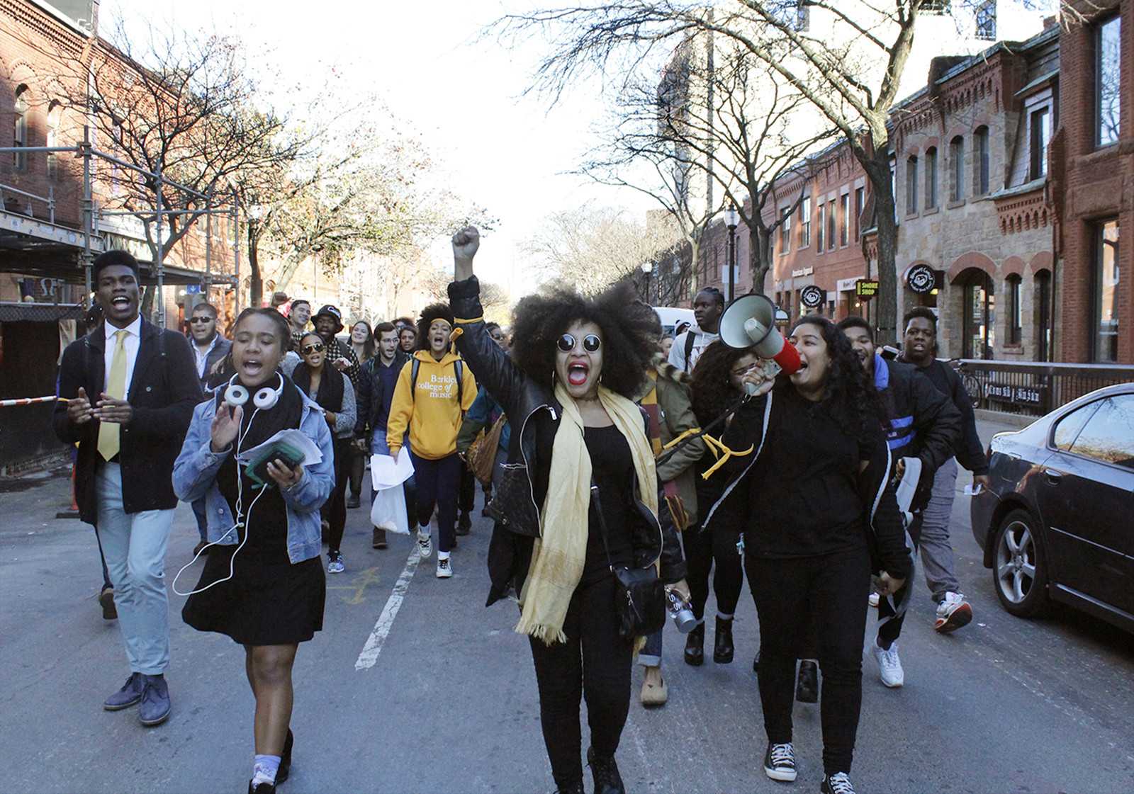 Simone Alyse, 20, a Berklee College of Music student from Everett, leads a student walkout down Newbury Street to the Boston Common during the “#wakeupworld” rally to support students of color. PHOTO BY BETSEY GOLDWASSER/DAILY FREE PRESS STAFF