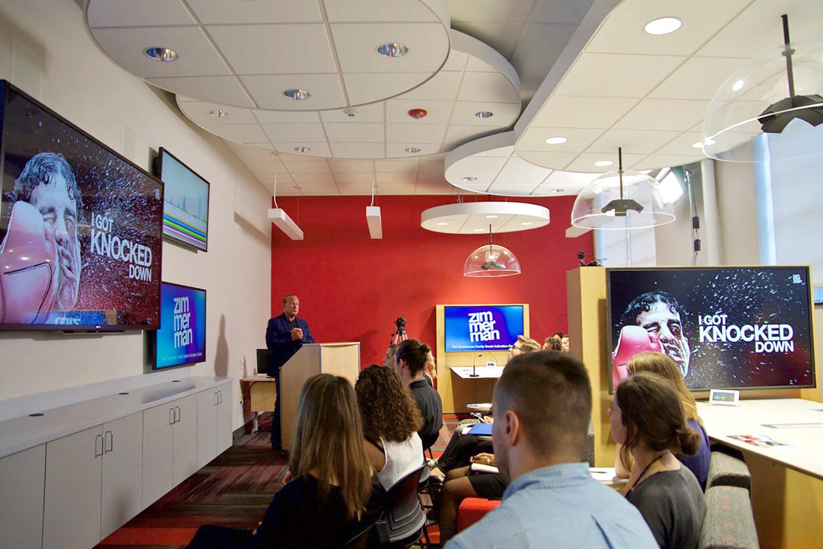 Jordan Zimmerman speaks at the ribbon cutting for the new Zimmerman Social Media Lab in the Boston University College of Communication Thursday afternoon. PHOTO BY SYDNEY MAES/ DAILY FREE PRESS STAFF