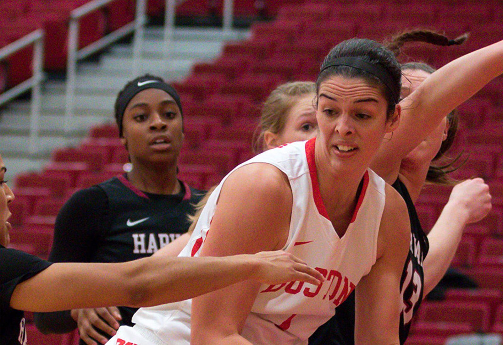 BOSTON, MA - NOVEMBER 22: Boston University Terriers center Sophie Beaudry (1) fights to move the ball out of the key to reset the Terrier play during the first half of the game between the Boston University Terriers and the Harvard Crimson on November 22nd, 2016, at the Case Center in Boston, MA. (Photo by John Kavouris/Daily Free Press)