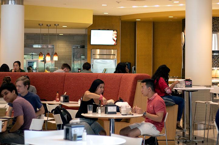 Students eating at Boston University’s Bay State Dining Hall. A recently announced plan named “Terrier Meal Share” is aimed at helping students in need by giving others the ability to donate swipes. SOFIA KOYAMA/ DFP FILE