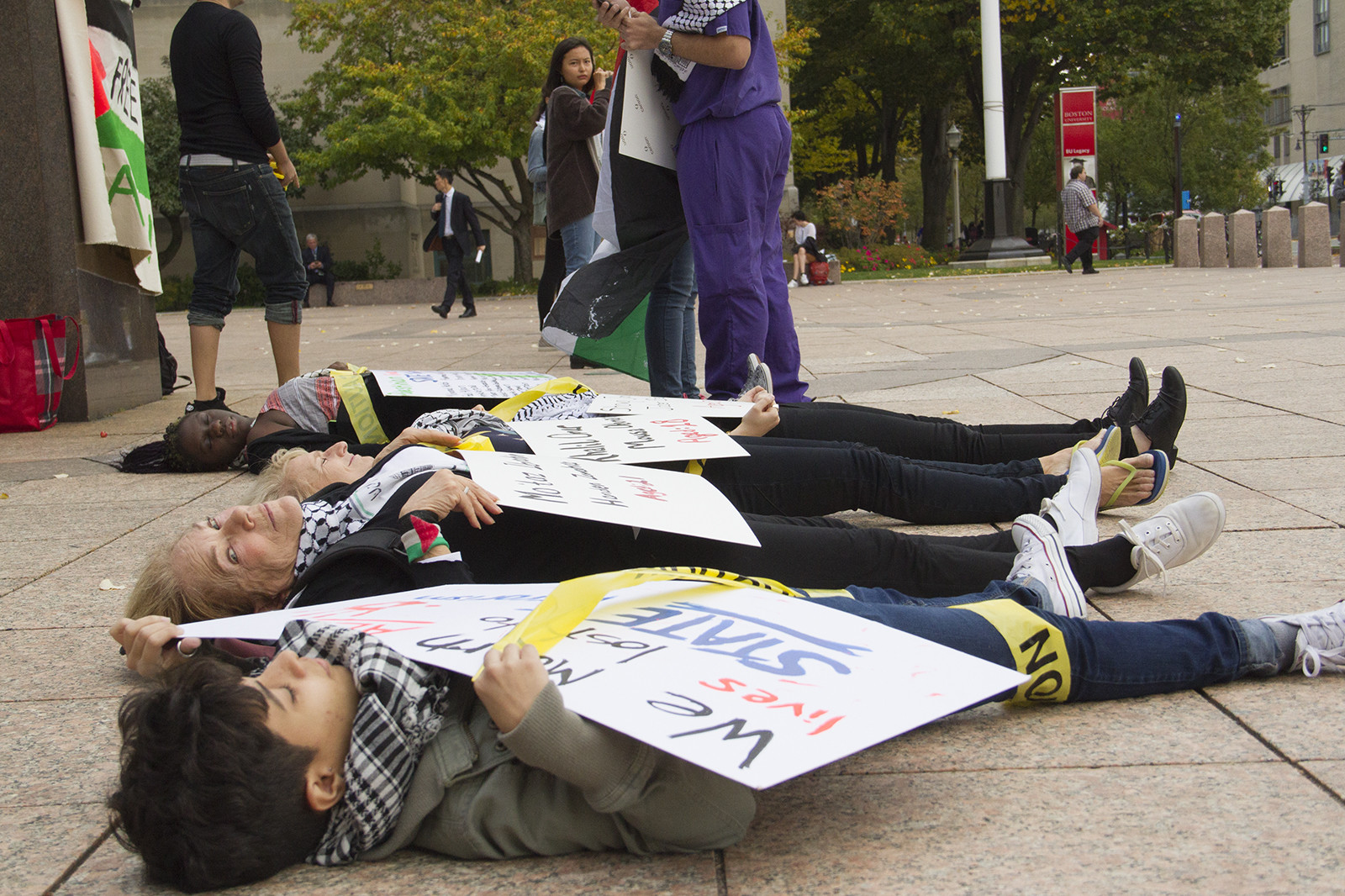 Students for Justice in Palestine held a die-in at Marsh Plaza Thursday afternoon in response to Boston University Students for Israel's "Vigil for Victims of Terrorism" on Oct. 16. PHOTO BY DANIEL GUAN/DAILY FREE PRESS STAFF