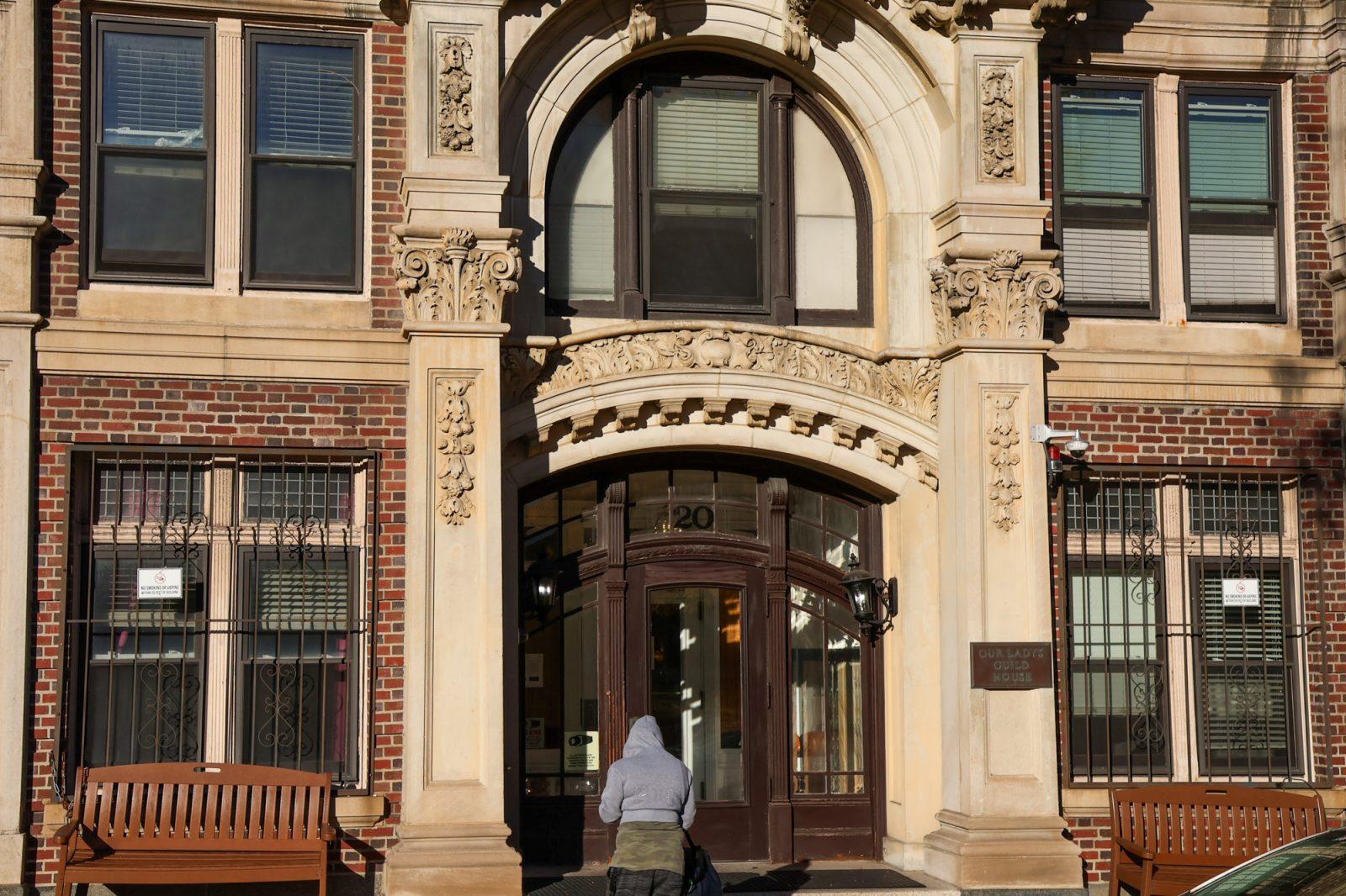 A person stands outside Our Lady’s Guild House on Charlesgate West. Our Lady’s Guild House is currently undergoing renovations to make the residence more appealing while keeping the rent affordable. MEGAN KWAN/DFP PHOTOGRAPHER   