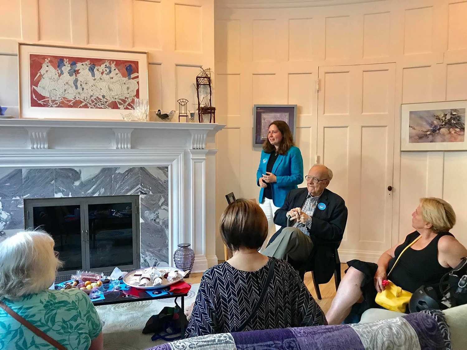 District 8 candidate Kenzie Bok speaks at a July 2019 fundraiser hosted at the Fenway home of Ward 4 Democratic Committee member. Bok leads the Boston City Council election in contributions, in both her race and the entire field of preliminary candidates. COURTESY OF KENZIE BOK