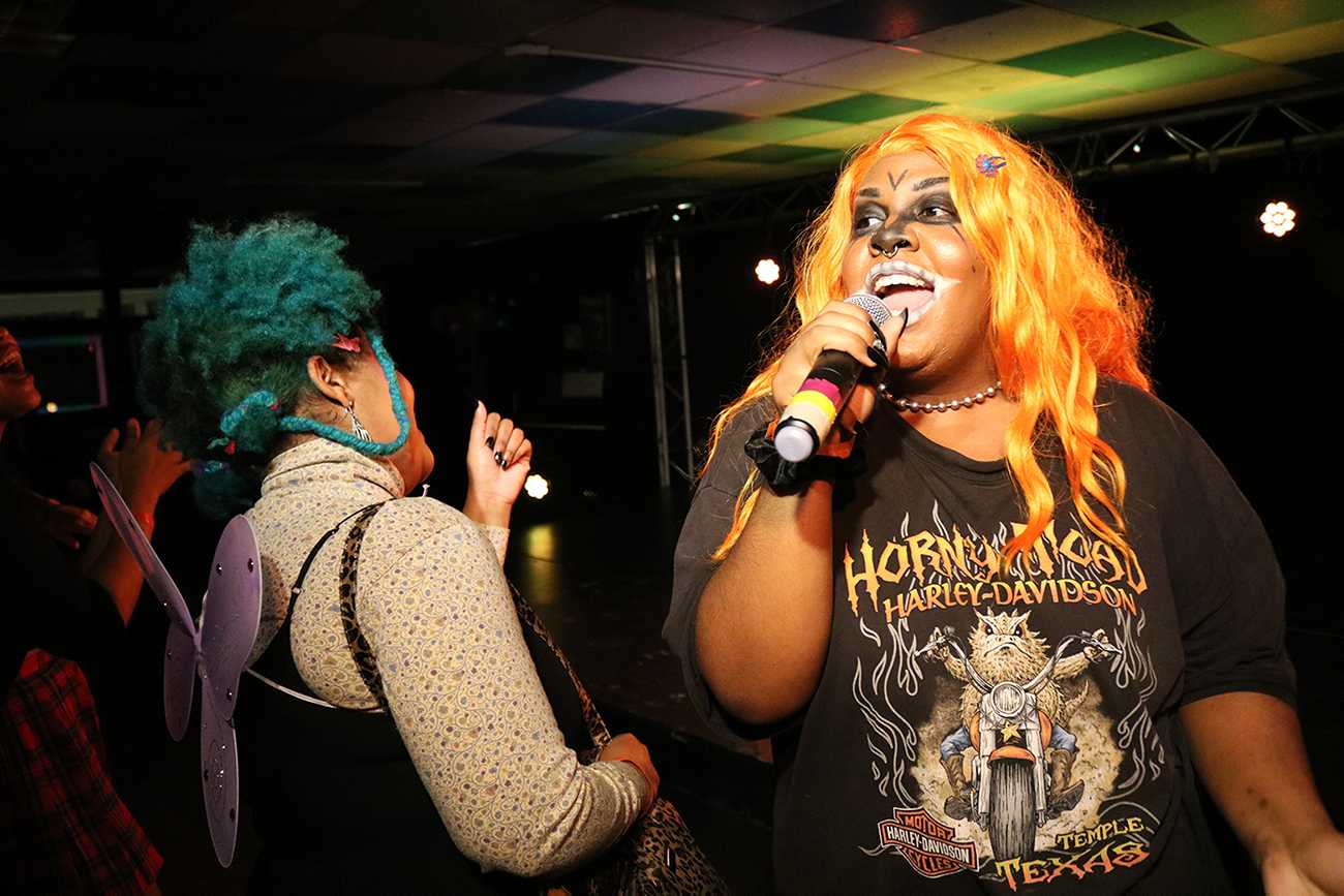 Boston artist Mick Beth performs on Friday night at the National Coming Out Day event hosted at BU Central in the George Sherman Union. CHIKA OKOYE/ DAILY FREE PRESS STAFF