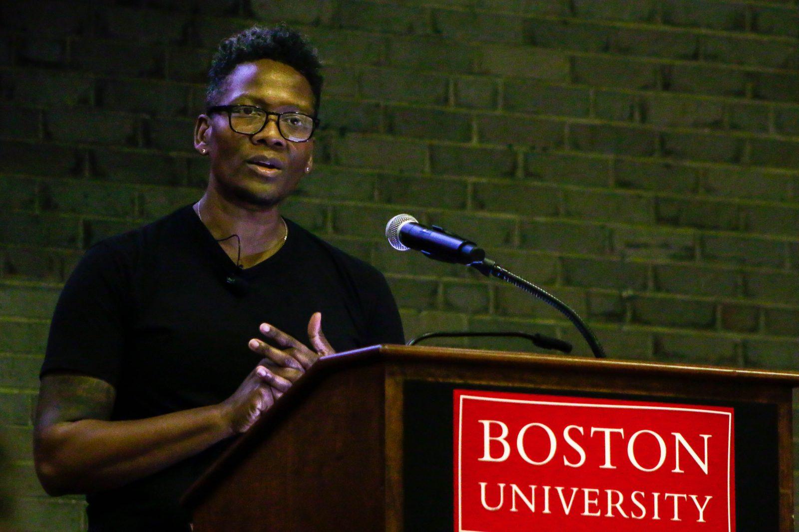 Actor lea robinson speaking at a podium